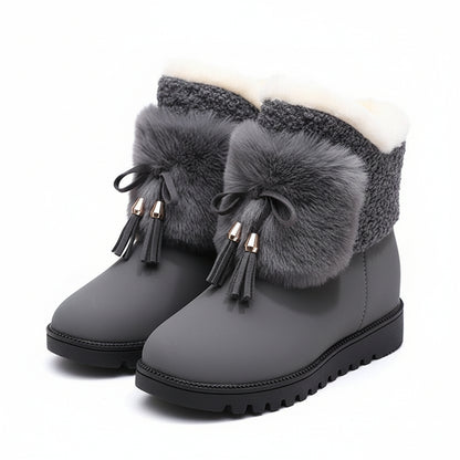 Bottes de neige femme mi-mollet doublées fourrure